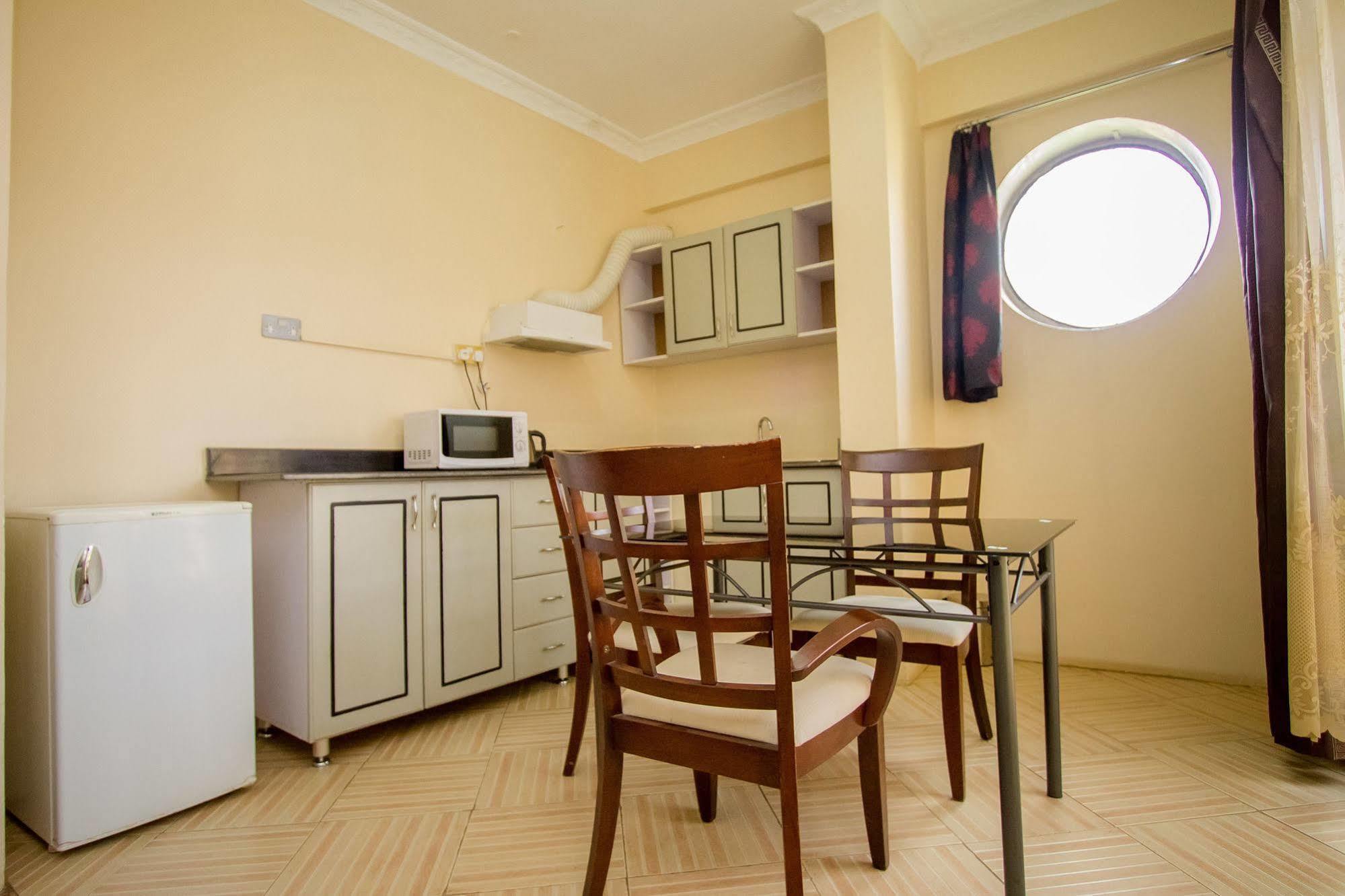 Grand Global Hotel Кампала Экстерьер фото