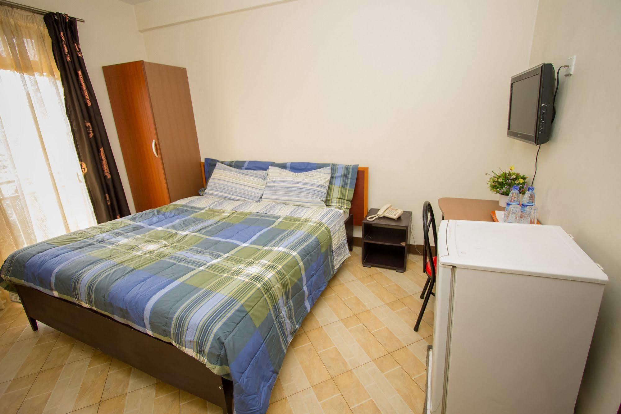 Grand Global Hotel Кампала Экстерьер фото